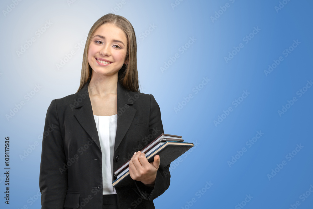 Smiling girl with books