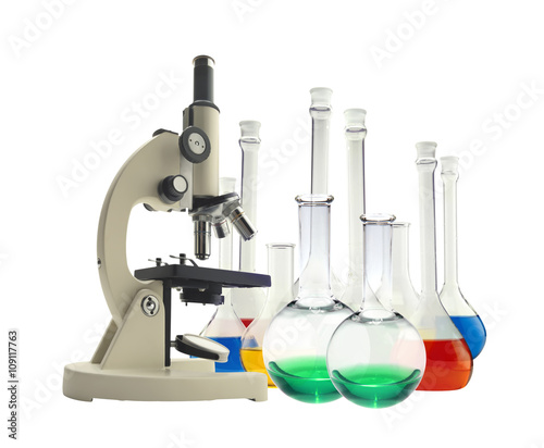 Laboratory metal microscope and test tubes with liquid isolated
