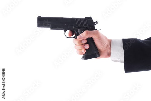 Man holding a pistol on a white background.