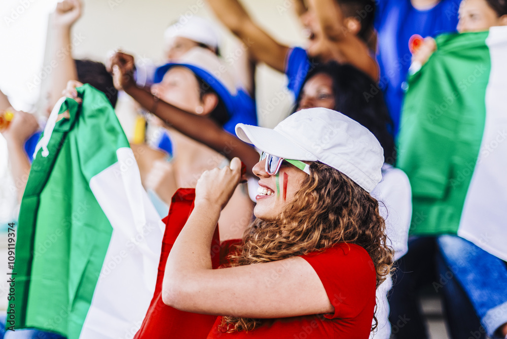 Obraz premium Supporters from Italy at stadium watching the match