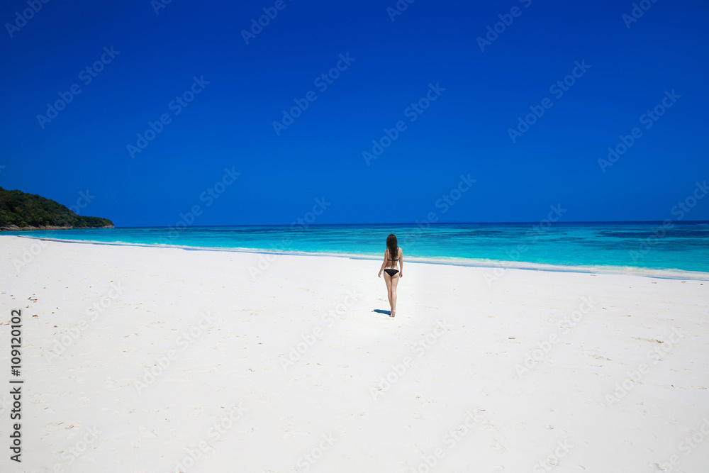 Enjoyment. Seashore. Happy free woman on tropical beach, exotic