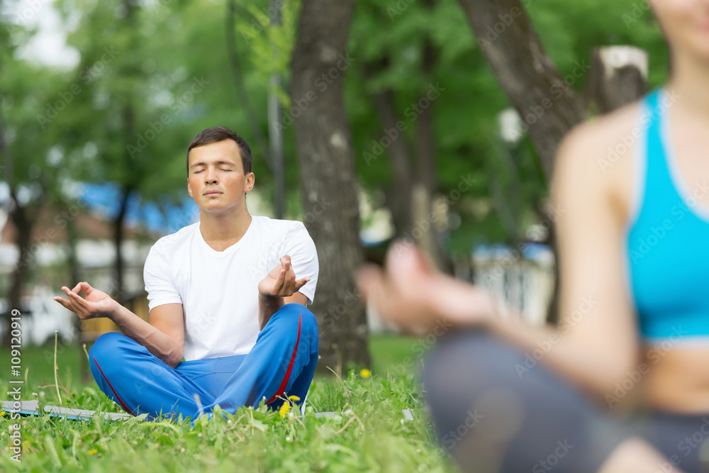 Having yoga practice in park Having yoga practice in park