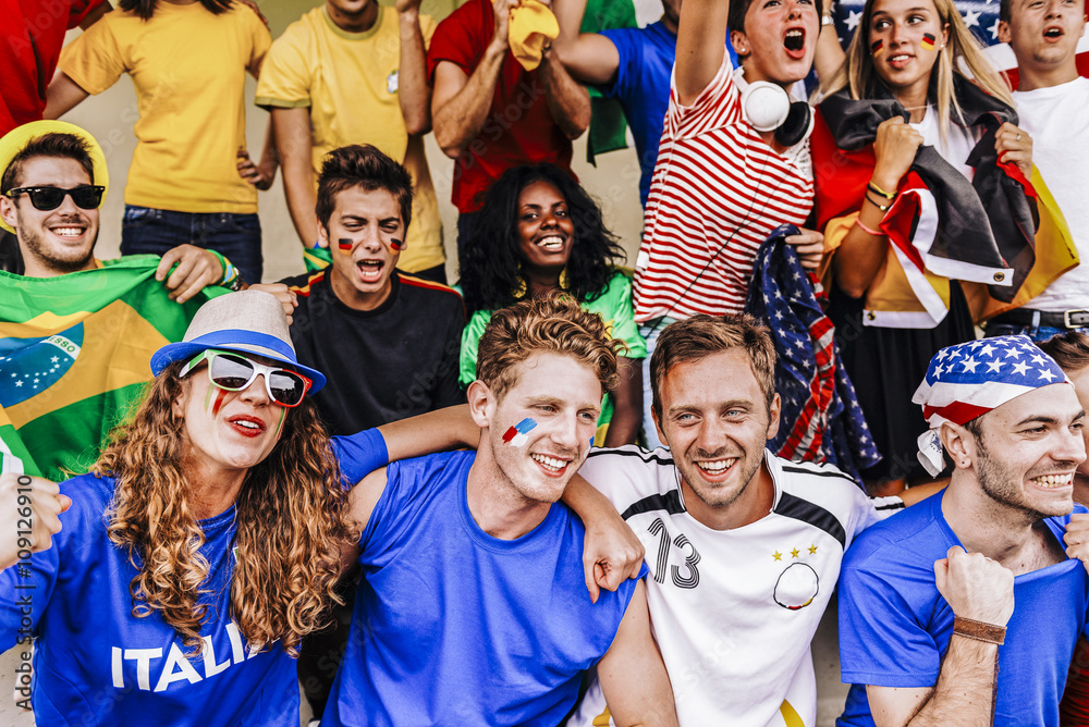 Fototapeta premium Supporters from Multiple Countries at Stadium All Together
