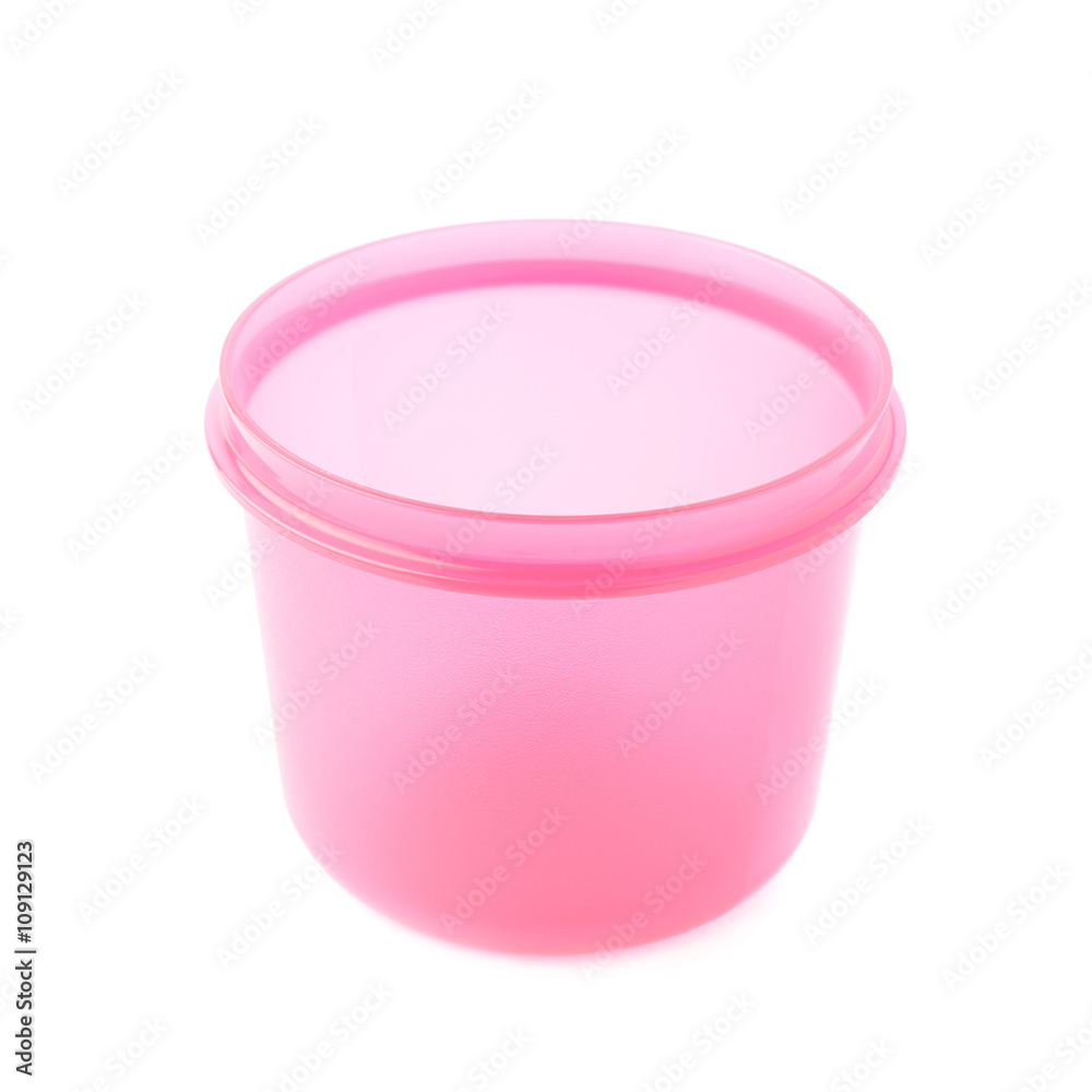 Pink plastic beaker cup isolated over the white background