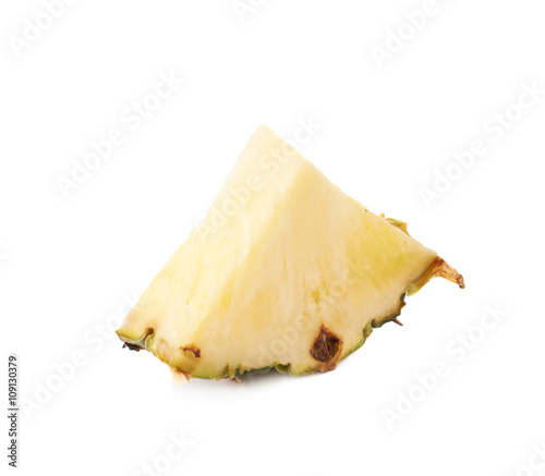 Slice of pineapple isolated over white background