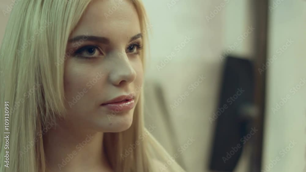 Girl model flirting with the operator at the shooting Girl model flirting with the operator at the shooting