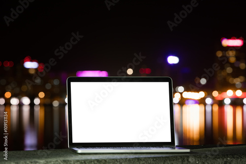 Notebook on the background of the city at night