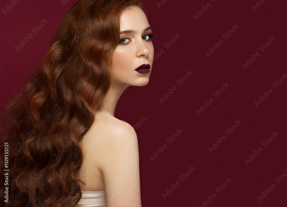 Beautiful Redhead girl with a perfectly curls hair and classic make-up. Beauty face. Beautiful Redhead girl with a perfectly curls hair and classic make-up. Beauty face.