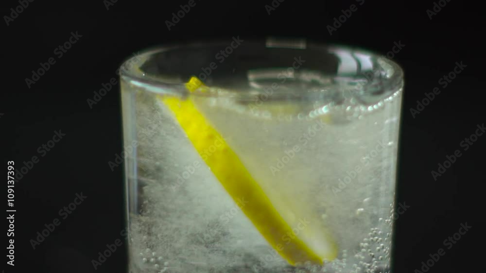 Round Slice of Lemon Drops in Water Round Slice of Lemon Drops in Water