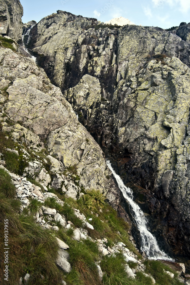 waterfall in Mala Zmrzla dolina valley in High Tatras mountains waterfall in Mala Zmrzla dolina valley in High Tatras mountains