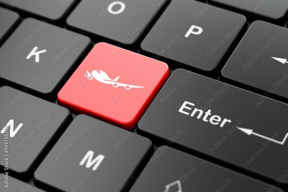 Fototapeta premium Travel concept: Airplane on computer keyboard background