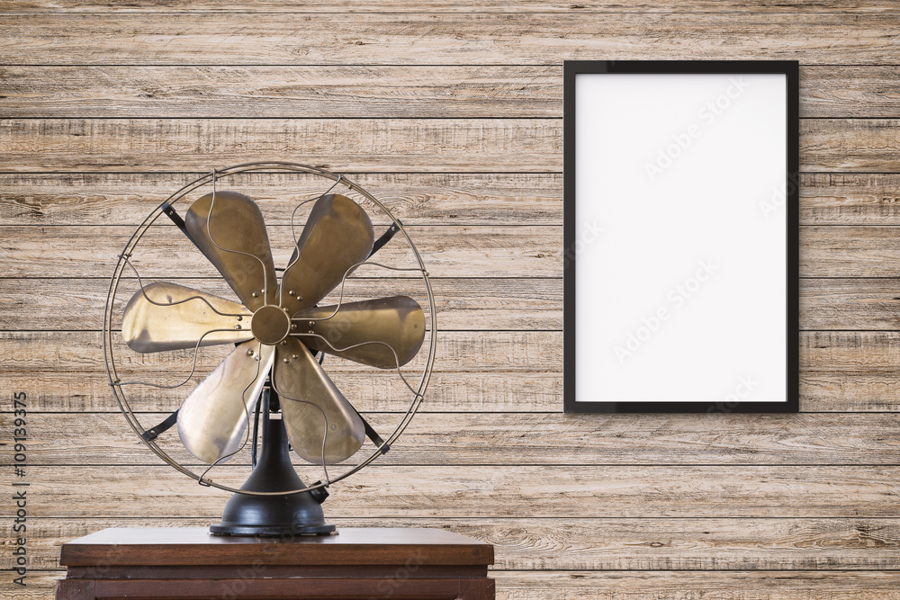 blank black picture frame hanging on wall in living room blank black picture frame hanging on wall in living room