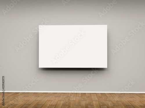 blank white frame hanging on wall