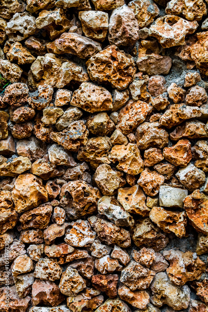 Stone wall with a porous surface Stone wall with a porous surface