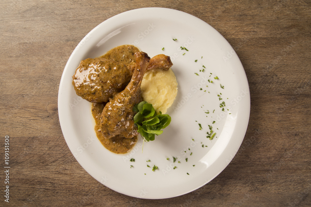 roast duck with mashed potato on the plate roast duck with mashed potato on the plate