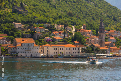 View from sea on the village Perast on coast of Boka Kotor bay. Montenegro. Adriatic sea.