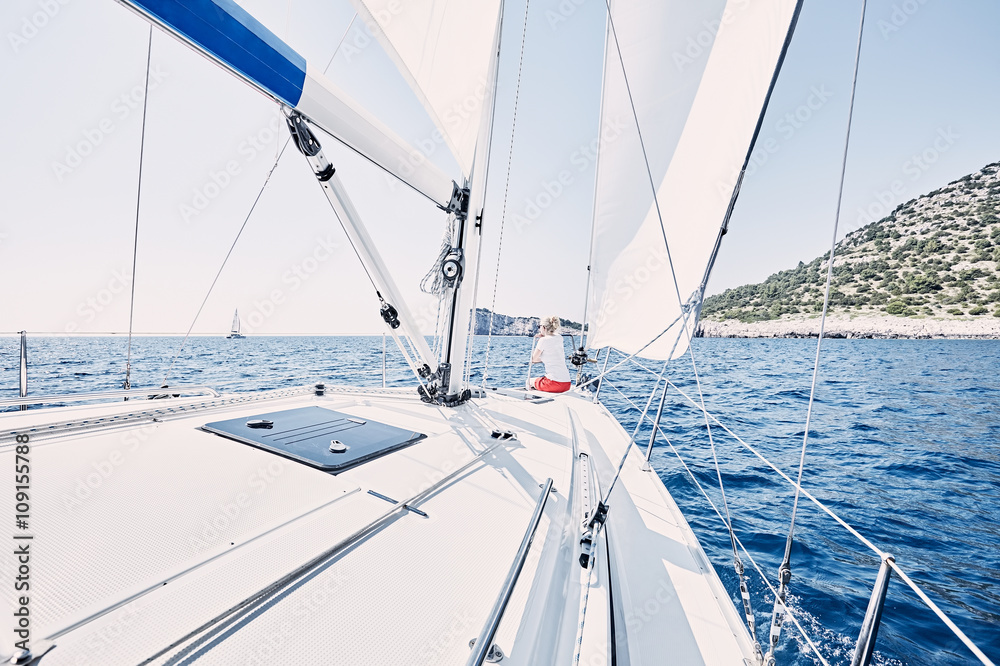 Fototapeta premium Girl on sailboat