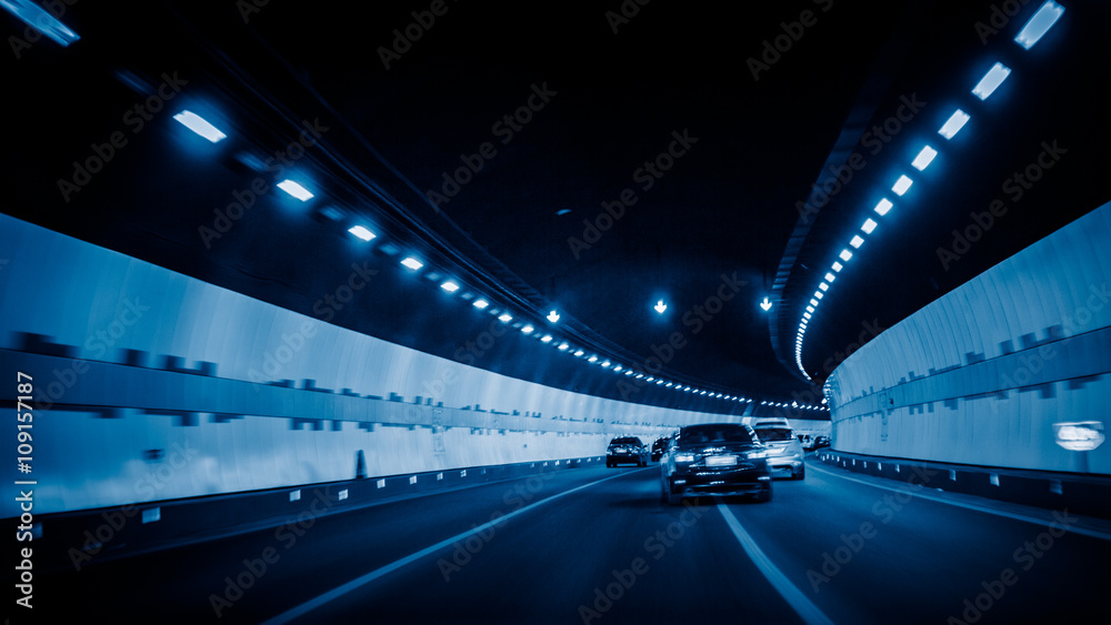 car driving through tunnel