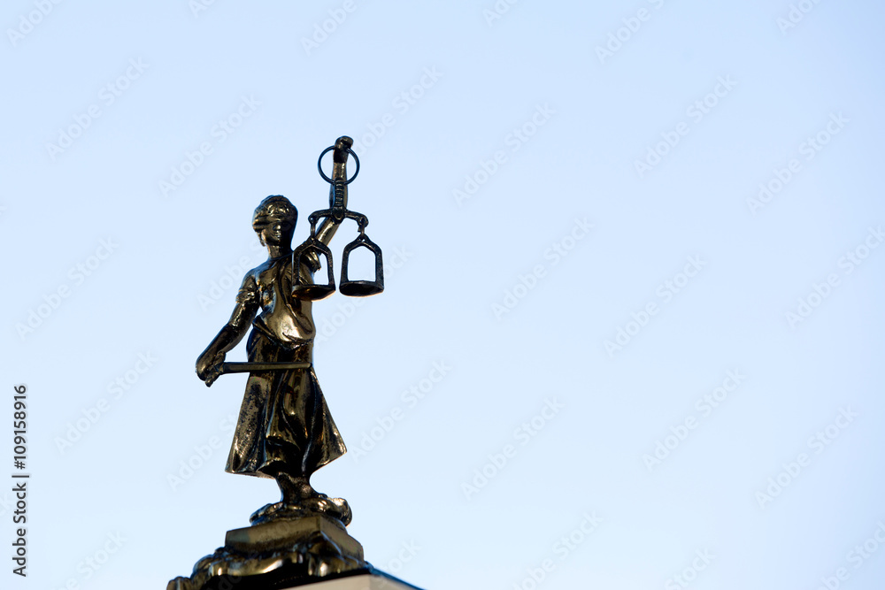 Lady Justice - Temida - Themis, silhouette on a blue background Lady Justice - Temida - Themis, silhouette on a blue background