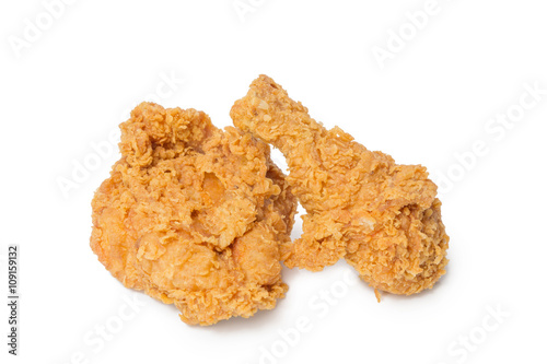Calf and chest fried chicken isolated on white
