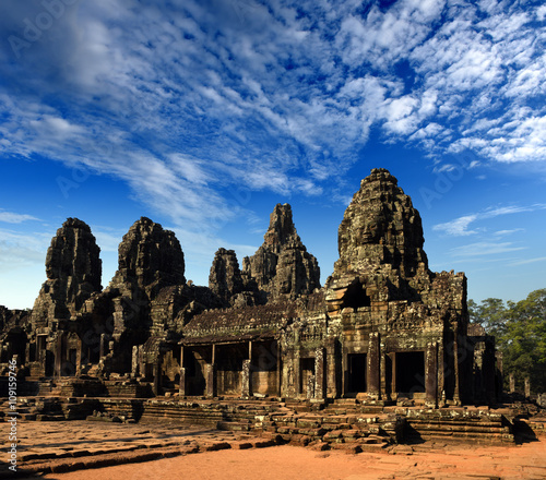 faces  heads of ancient Bayon Temple At Angkor Wat  Siem Reap  Cambodia 