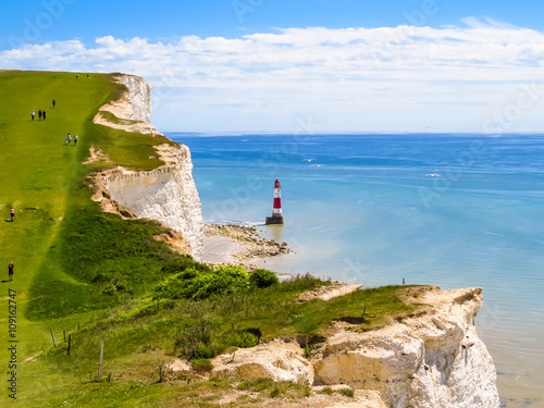 White chalk cliffs and Beachy Head Lighthouse, Eastbourne, East Sussex, England