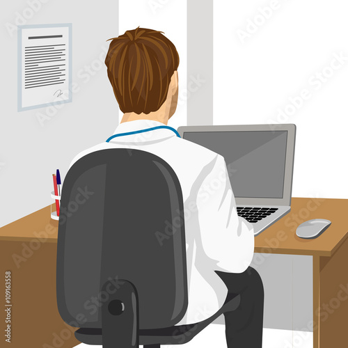 medical doctor using laptop in clinic 