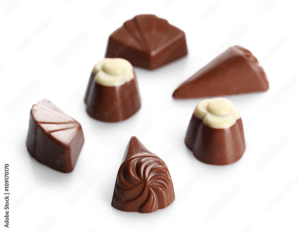 Assorted chocolate candies, isolated on white