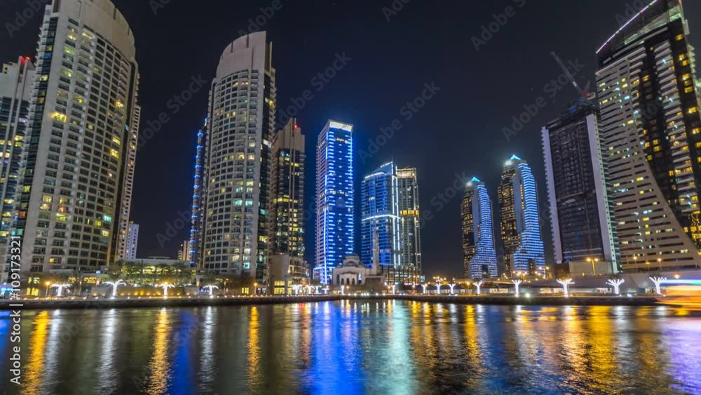 View of Dubai Marina Towers and canal in Dubai night timelapse hyperlapse View of Dubai Marina Towers and canal in Dubai night timelapse hyperlapse