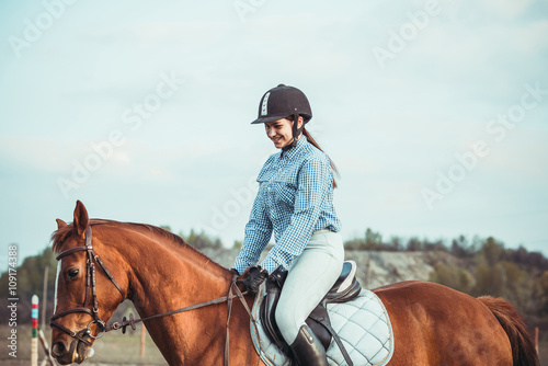 Girl riding a horse