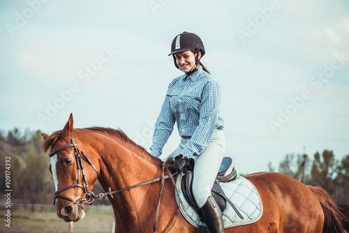 Girl riding a horse