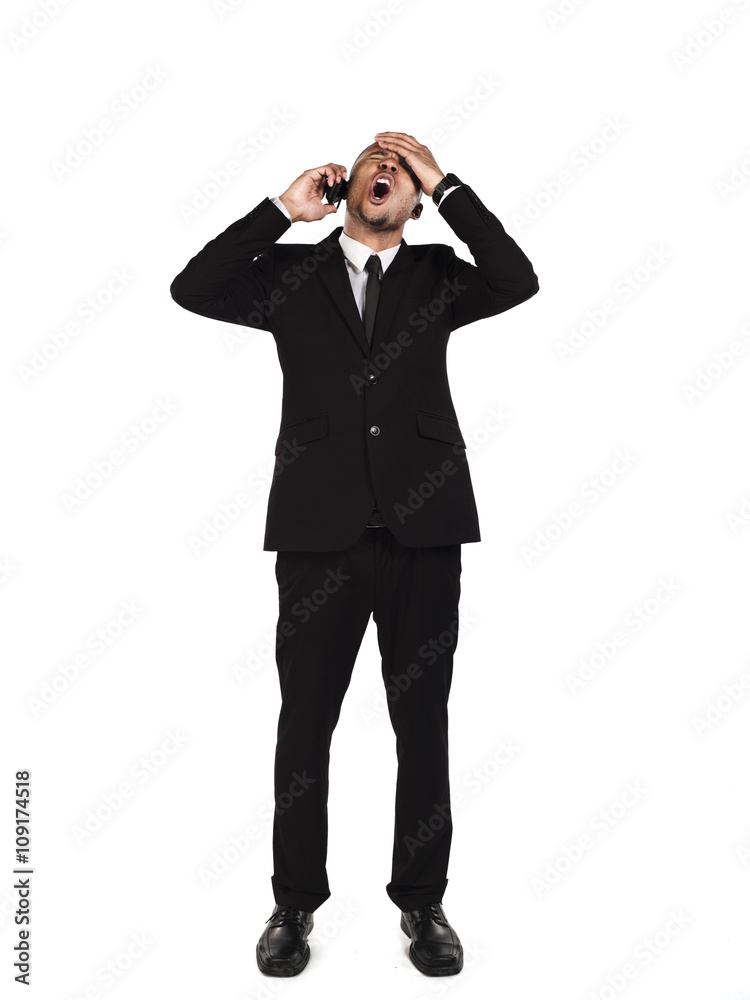 angry businessman talking on cellphone. angry businessman talking on cellphone.