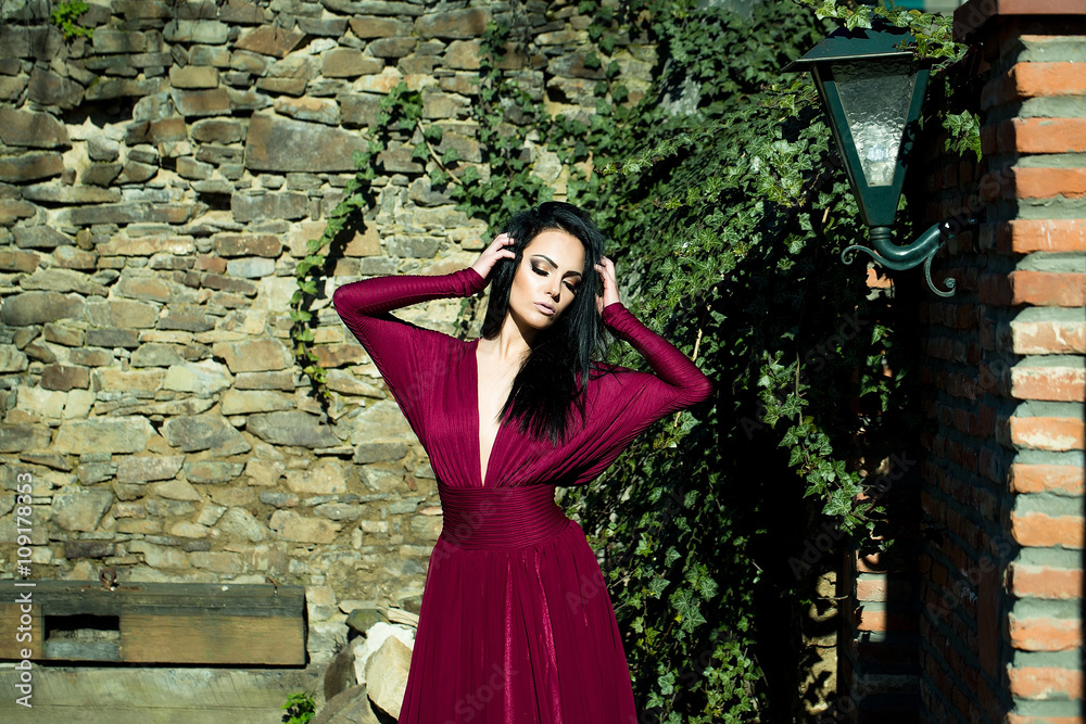 Woman in red dress outdoor