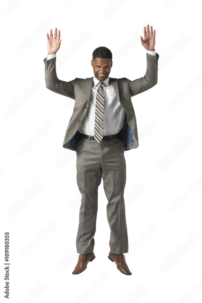 businessman raising his hands