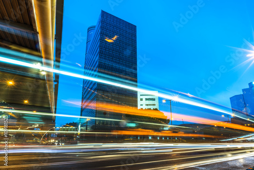 Canvas Print light trails through the footbridge,hongkong china.