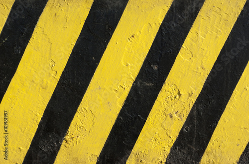 black and yellow painted caution sign metal texture  © Jacques Durocher