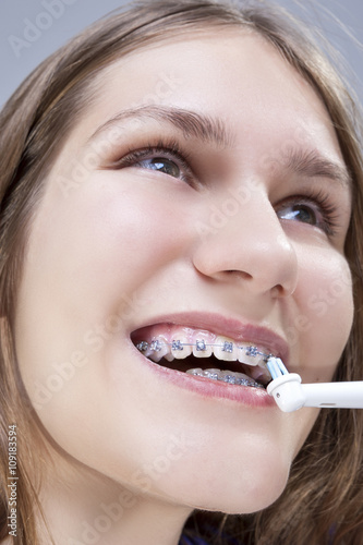 Dental Concept and Ideas. Closeup Portrait of Caucasian Teenager With Teeth Braces