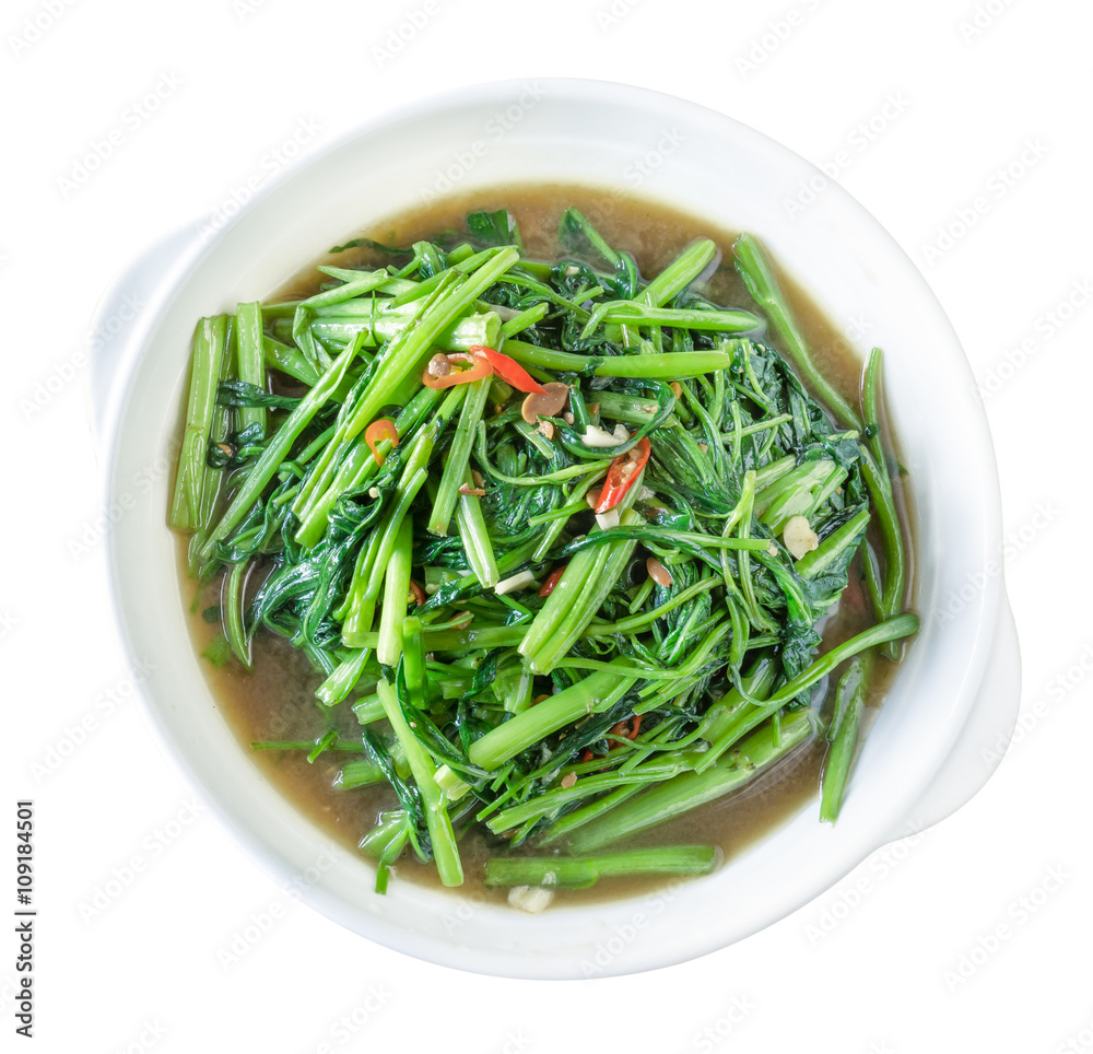 Stir Fried Water Spinach or pak boong fai daeng on white dish,clipping path Stir Fried Water Spinach or pak boong fai daeng on white dish,clipping path