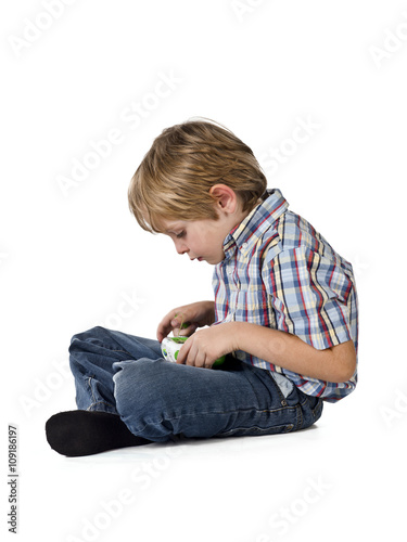 boy playing video game.