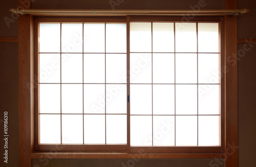 Traditional Japanese rice paper window with sliding wooden frame