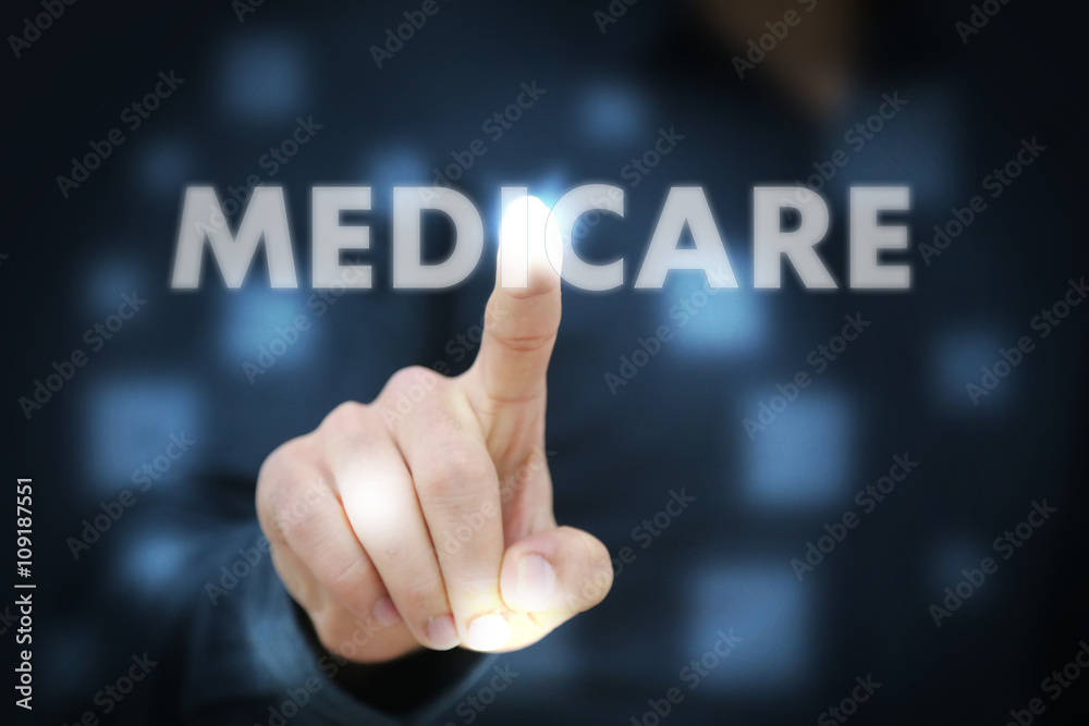 Businessman touching Medicare Businessman touching Medicare