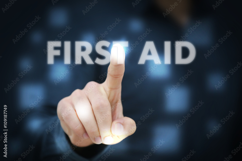 Businessman touching First Aid Businessman touching First Aid