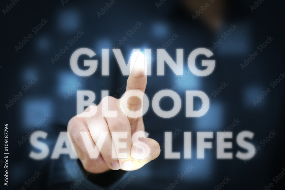 Businessman touching Giving Blood Saves Lifes Businessman touching Giving Blood Saves Lifes