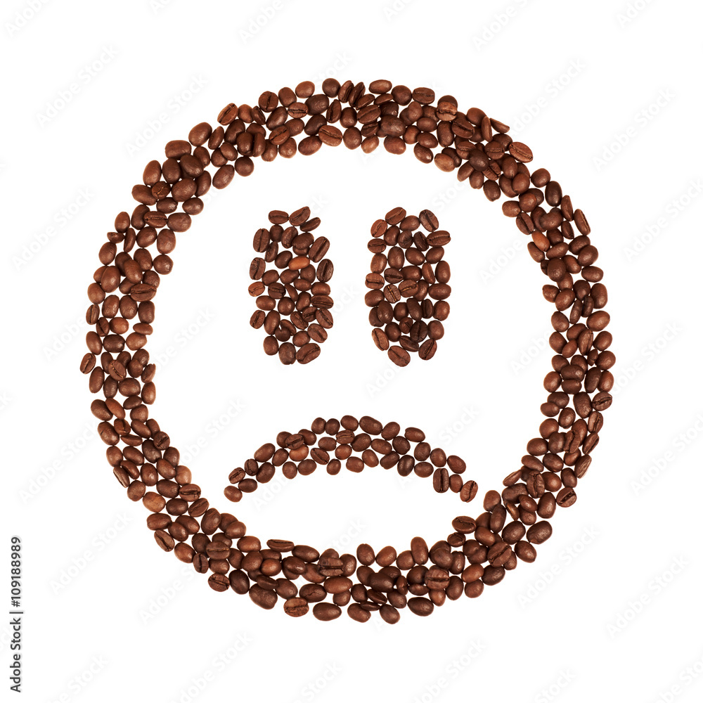 Anti smile shaped coffee beans isolated on white background Anti smile shaped coffee beans isolated on white background