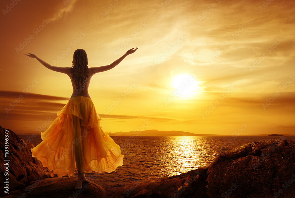 © inarik - Calm Woman Meditating on Sunset Beach, Relax in Open Arms Pose © inarik - Calm Woman Meditating on Sunset Beach, Relax in Open Arms Pose