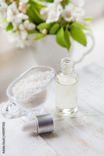 spa salt with flower with massage oil - flowers background