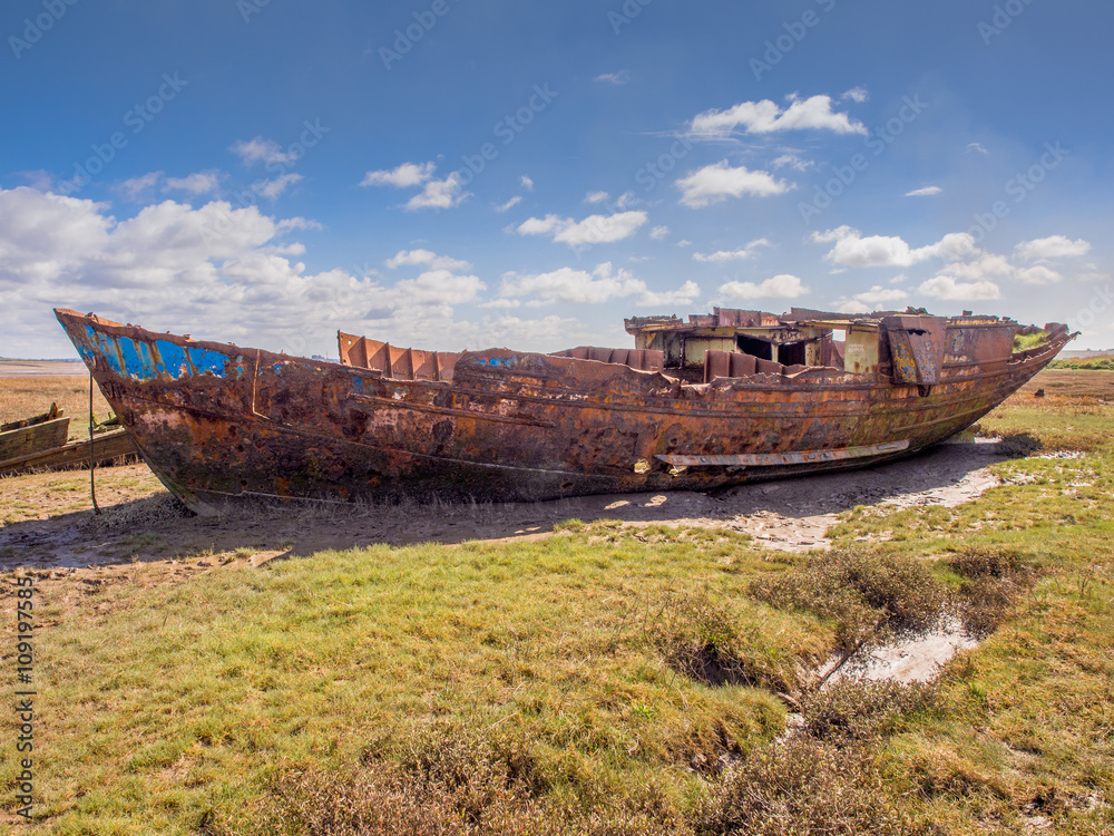 Old wooden and metal boats at Fleetwood Boat Graveyard, Fleetwood, Lancashire, UK Old wooden and metal boats at Fleetwood Boat Graveyard, Fleetwood, Lancashire, UK