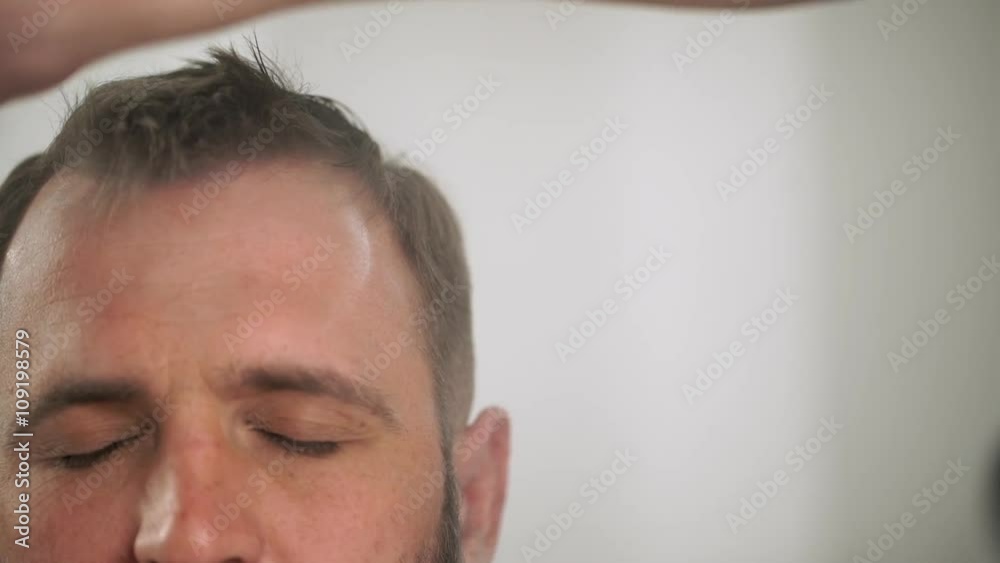 Handsome man in the barbershop. Slow motion. Close up. Handsome man in the barbershop. Slow motion. Close up.