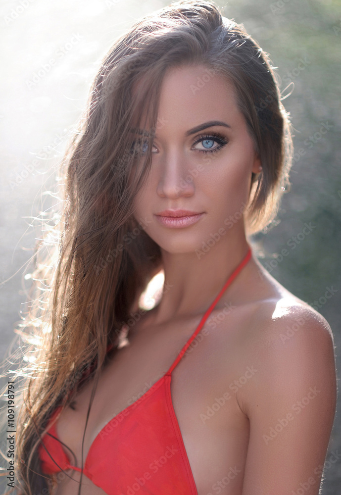 portrait of a beautiful sexy woman on the beach portrait of a beautiful sexy woman on the beach