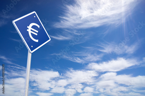 Blue Road Sign with Euro Sign Inside on Blue Sky Background © klenger